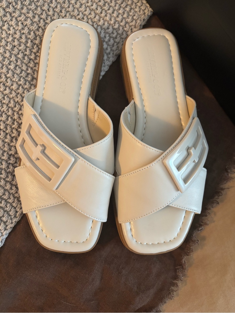 Liverpool Off-White Crisscross Slide Sandals with Buckle Accent